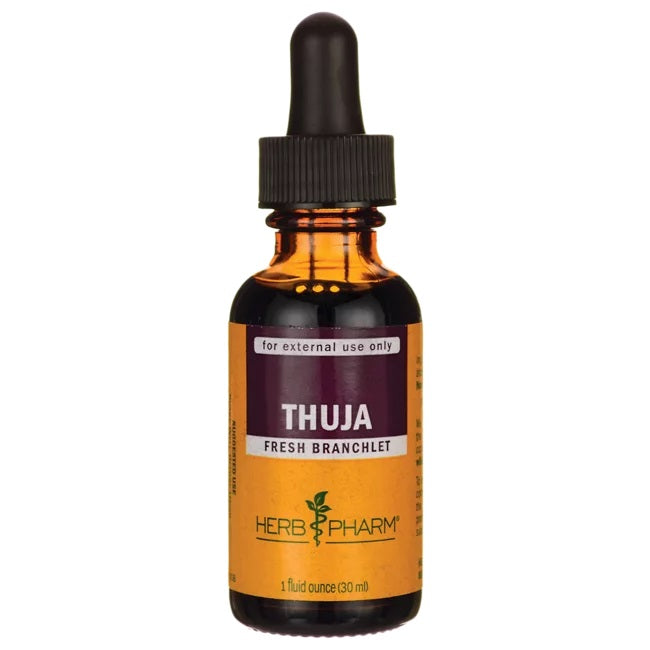 A bottle of Thuja 1 oz with a dropper, labeled for external use only, by Herb Pharm.